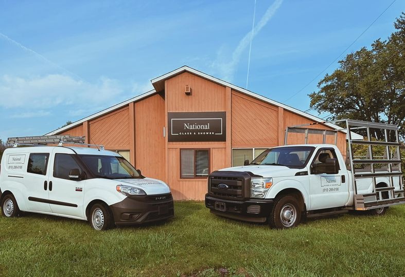 National Glass and Shower storefront and service trucks